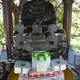 Offerings of TH Milk's products are made to Buddha at TH Milk's operations in Nghia Son, Vietnam. Image by Mark Hoffman. Vietnam, 2019. 
