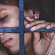 A bruised transgender woman is forced to wait for trial confined with male prisoners, many of whom abuse her. Image by Ana María Arévalo. Venezuela, 2017.