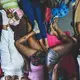 Twenty-two female detainees await trial for months or even years at La Yaguara Detention Center. They are packed into a 9-by-12-foot cell where most sleep on mattresses on the floor. Image by Ana María Arévalo. Venezuela, 2018. 