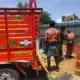 Workers at Shakthi Ganga lift materials into a lorry. The man will be paid 320 rupees, while the women will be paid 160 rupees each.&nbsp;Image by Praveena Somasundaram. India, 2017.