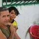 A father living with HIV/AIDS and his child living at&nbsp;Fundación Hoasis. Image by Patrick Ammerman. Colombia, 2019.