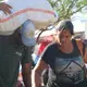 Pendular migrants cross the border into Colombia during the day to buy food, household products, and medicine that is unavailable in Venezuela. They&nbsp;return to Venezuela carrying what they bought. Image by Patrick Ammerman. Venezuela, 2019.