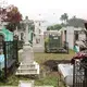 Muddy pathways weave in and out of gravestones at the Cementerio Municipal Santa Tecla.&nbsp;Image by Lauryn Claassen. El Salvador, 2017.