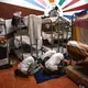 Asylum-seekers pray next to their beds at the Modern Christian Mission Church in Fuerteventura, one of the Canary Islands, Spain, on Saturday, Aug. 22, 2020.&nbsp;Image by Emilio Morenatti/AP Photo. Spain, 2020.