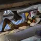 Hady Baye, 31, rests in a bunk bed at the Modern Christian Mission Church in Fuerteventura, one of the Canary Islands, Spain, on Saturday, Aug. 22, 2020.&nbsp;Image by Emilio Morenatti/AP Photo. Spain, 2020.