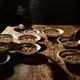 Cooks prepare lunch in a shelter for migrants in Tijuana. Image by Erika Schultz. Mexico, 2019.