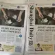 Copies of the Shanghai Daily set out on a table in the Daily's newsroom on Sunday, Sept. 30, 2017, in Shanghai. Image by Kelsey Kremer. China, 2017.