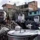 Serving food at the public soup kitchen on Perito Moreno Avenue. Image by Anita Pouchard Serra. Argentina, 2020.