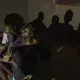 Ethiopian migrant boys ages 13 to 16, who crossed into Djibouti at night, rest in an abandoned one-floor, brick house in Ali Sabeih, Djibouti, July 11, 2019. Migrants take shelter here until early morning to continue their journey. Image by AP Photo / Nariman El-Mofty. Djibouti, 2019.