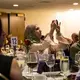 Sawsan Morrar, 2017 UC Berkeley Graduate School of Journalism fellow, photographs during the evening remarks. Image by Lorraine Ustaris. Washington, D.C., 2018. 