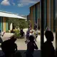 Students begin morning recess at Ecole Fondamentale Complete Breda de Canaan in the Canaan 3 neighborhood. The K-8 facility is the first public school in greater Canaan. Students who score at the top of a competitive entrance exam are accepted to the school, which opened in fall 2018 and already has a long waiting list. Image by Allison Shelley. Haiti, 2019.