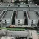 Aerial view of the General Hospital in Port-au-Prince. The sprawling new hospital campus was one of the first projects approved for Haiti’s reconstruction following the earthquake of Jan. 12, 2010. A decade later, the 534-bed teaching hospital has yet to open its doors to a single patient. Image by Jean Marc Hervé Abélard / The Miami Herald. Haiti, 2019.