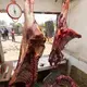 Each day the butcher shops sell meat that was slaughtered earlier in the morning. Image by Mark Hoffman. Kenya, 2017.