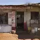 Beef carcasses hang in a butcher shop in the Kawangware slum. Image by Mark Hoffman. Kenya, 2017.