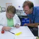 Student intern Matthew Moore and operations manager William Bacon&nbsp;inventory dead mosquitoes at MosquitoMate in Lexington, Ky. MosquitoMate breeds mosquitoes carrying a bacterium called Wolbachia within their cells. The eggs they fertilize never fully develop. Image by Mark Hoffman. United States, 2017.&nbsp;