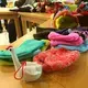 Baby clothes made by the elderly at an orphanage in Shanghai. Image by&nbsp;Argentina Maria-Vanderhorst. China, 2018.