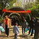 At the marriage market in Shanghai parents post resumes of their children in hopes of finding a spouse for them. The young and their elders read the resumes as they walk through the market. Image by Argentina Maria-Vanderhorst. China, 2018.