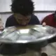 In this Thursday, Oct. 31, 2019, photo, recovering drug users eat a meal at a de-addiction center in Kapurthala, in the northern Indian state of Punjab. India has twice the global average of illicit opiate consumption. Researchers estimate 4 million Indians use heroin or other opioids, and a quarter of them live in the Punjab, India’s agricultural heartland bordering Pakistan, where some of the most vulnerable are driven to drugs out of desperation. Image by Channi Anand / AP Photo. India, 2019.