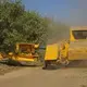 Less dusty harvesting methods exist, but they require expensive investments in new machinery. Image by Larry C. Price. California, 2018.