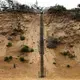 A long wooden staircase led to the top of an eroding sand cliff at Lecount Hollow Beach in Wellfleet. Image by John Tlumacki. United States, 2019.