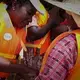 Dr. Flower Msuya is piloting a new technology for deep sea farming, adapted from Brazil. So that female farmers can safely go out to the deeper waters, she provides life jackets for the women who can't swim. Image by&nbsp;Haley Joelle Ott. Zanzibar, 2017.