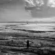 Over the last 20 years, climate change has led to higher temperatures in the region and caused the lake to shrink. Most of the lake's surface area is now a cracked, salty desert. Image by Ako Salemi. Iran, 2016.